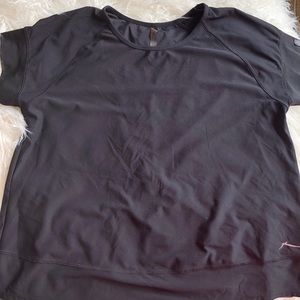 Black exercise top with cross back and mesh
